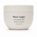 Private label fine to medium hair mask in an 8 oz jar beside towels and a wide-tooth comb