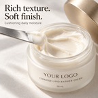 Open ceramide cream jar with a spatula showing the cushioning ivory texture