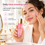 Adult model applying serum to her cheek while holding the closed pink bottle.